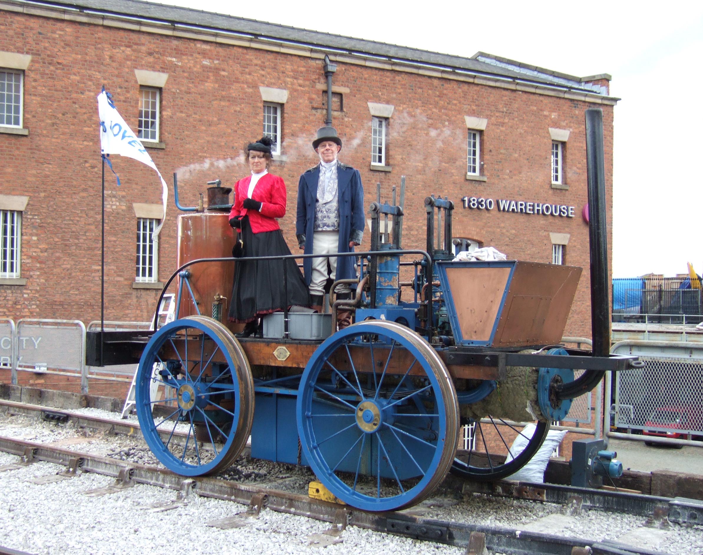 (Working replica of Novelty at the Museum of Science and Industry, Manchester. Standing on the locomotive are Mr & Mrs Braithwaite, Mr Braithwaite is a descendant of the locomotive builder. 17th September 2005 Photographer - A.M.Hurrell)